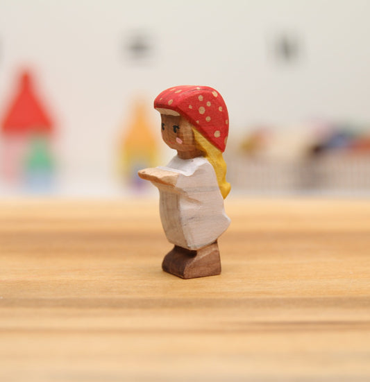 Mushroom child with long blonde hair