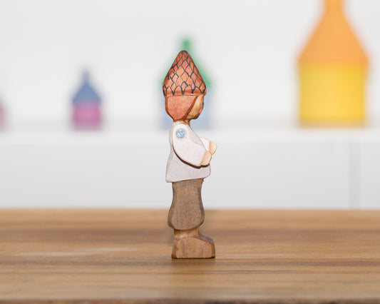 Tall Pine cone child with brown hair