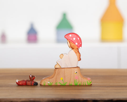 Mushroom child with tree stump and little fox friend