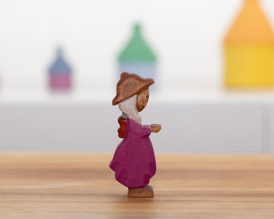 Beekeeper child in pink dress
