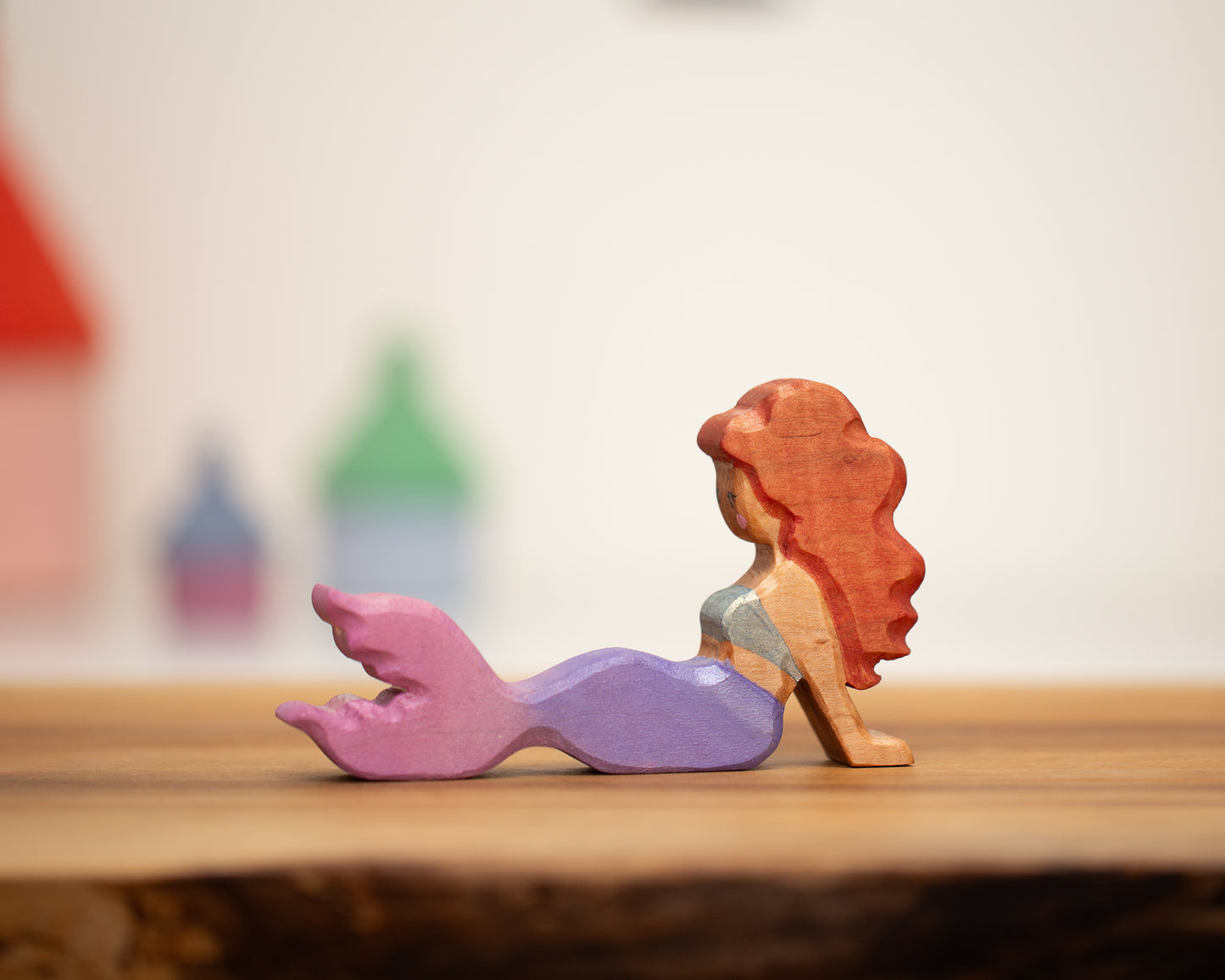 Adult reclining mermaid purple/pink with auburn hair