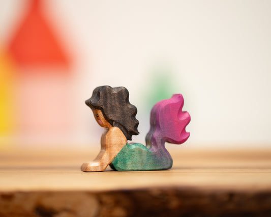 Swimming teal/pink mermaid with black hair