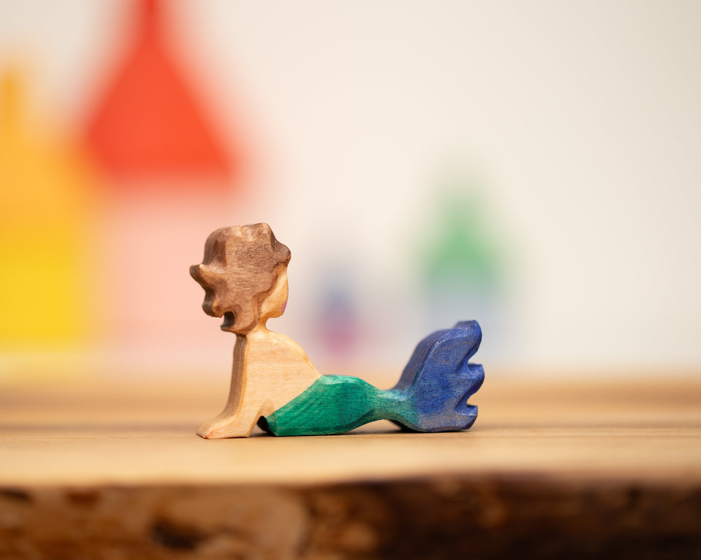 Reclining green/blue mermaid with brown hair