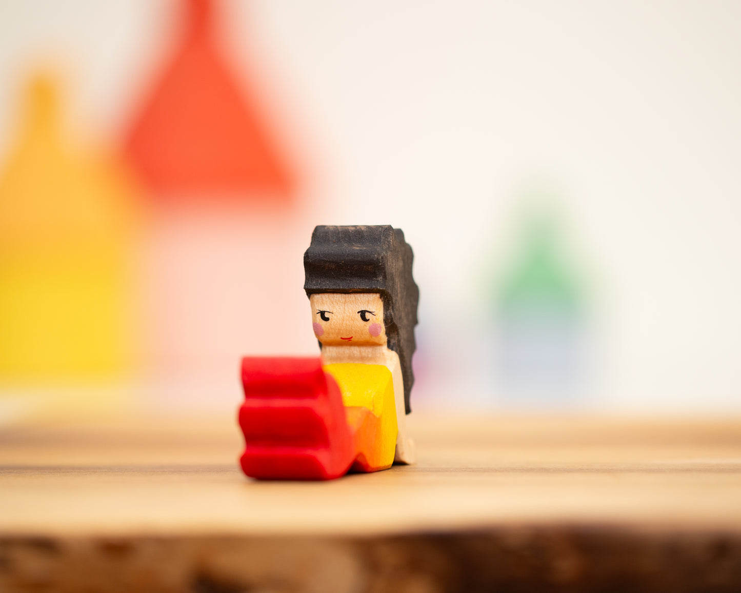 Reclining red/yellow mermaid with long black hair