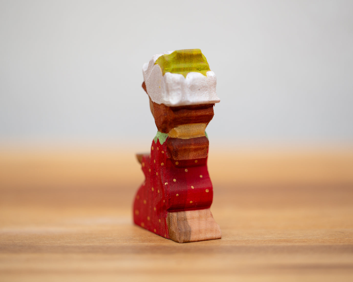 Kneeling strawberry child